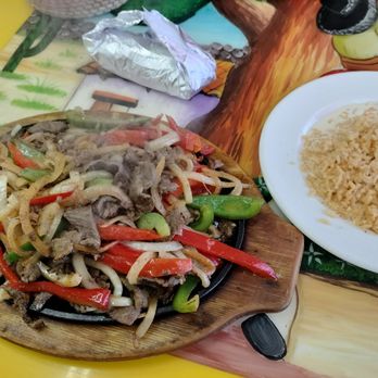 Mexico City 2 - Steak fajita with rice with white cheese on the rice. - Mexican Near Me - Clarksville, Indiana Mexico City 2 - Steak fajita with rice with white cheese on the rice. - Mexican Near Me - Clarksville, Indiana