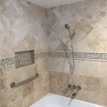 Daniel Tile - Same natural stone tile with contrasting pattern - Flooring Near Me