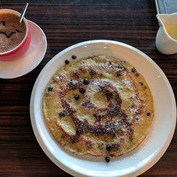 Mit Frischen Heidelbeeren & Boubon Vanillesosse (Pancake with Blueberries & Boubon Vanilla) + cup of Hot Chololate Mit Frischen Heidelbeeren & Boubon Vanillesosse (Pancake with Blueberries & Boubon Vanilla) + cup of Hot Chololate
