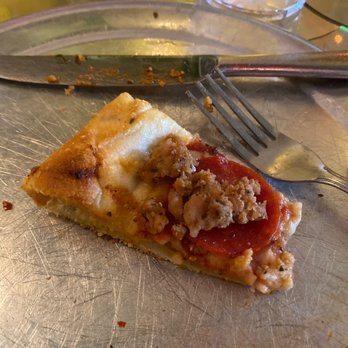 Satchel's Pizza - Remnants of a delicious slice of sausage and pepperoni! - Pizza Near Me - Gainesville, Florida Satchel's Pizza - Remnants of a delicious slice of sausage and pepperoni! - Pizza Near Me - Gainesville, Florida