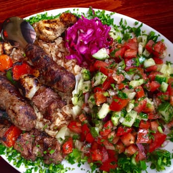 Tanoreen - Grilled Combo (Lamb and Chicken) over rice and salad - Middle Eastern Near Me - Brooklyn, New York Tanoreen - Grilled Combo (Lamb and Chicken) over rice and salad - Middle Eastern Near Me - Brooklyn, New York