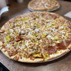 Richards Pizza - Pepperoni, sausage and banana peppers!