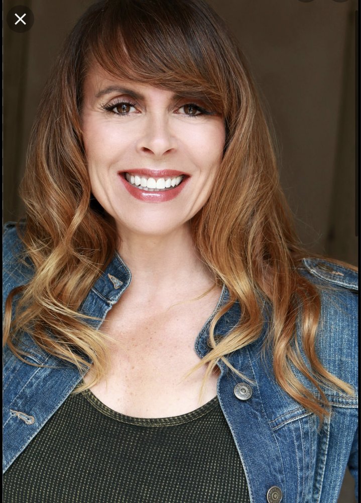 Irena at Fellow Barber Logo