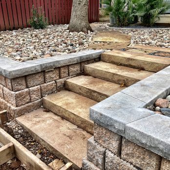 Legacy Landscapes - Diamond pro stone-cut block wall with sandstone color landing step units for easy up and down. - Landscaping Near Me