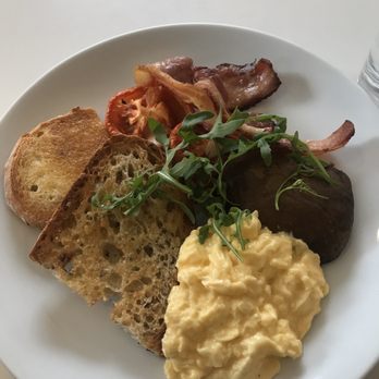 The Modern Pantry - Two Two Fried , Scrambled Or Poached Organic Free Range Eggs with toast, bacon, slow roasted tomatoes, and braised mushroom - Breakfast & Brunch Near Me - London, XGL The Modern Pantry - Two Two Fried , Scrambled Or Poached Organic Free Range Eggs with toast, bacon, slow roasted tomatoes, and braised mushroom - Breakfast & Brunch Near Me - London, XGL