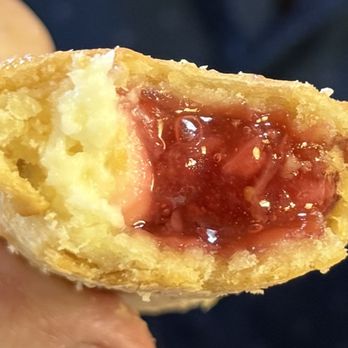 Chester's Chicken - Cut view of the fried strawberry pie. The cream cheese filling was a happy surprise! - Fast Food Near Me - Lake Isabella, California Chester's Chicken - Cut view of the fried strawberry pie. The cream cheese filling was a happy surprise! - Fast Food Near Me - Lake Isabella, California