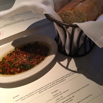 Piatti Danville - Bread with seasoned olive oil dipping sauce - Italian Near Me - Danville, California Piatti Danville - Bread with seasoned olive oil dipping sauce - Italian Near Me - Danville, California