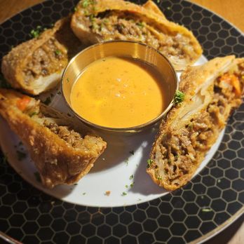Huncho House - Fusion Roll cheesesteak - New American Near Me - Hyattsville, Maryland