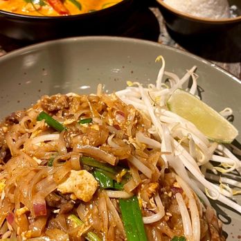 Up Thai - Pad Thai and Panang Curry in the background. - Thai Near Me - New York, New York Up Thai - Pad Thai and Panang Curry in the background. - Thai Near Me - New York, New York