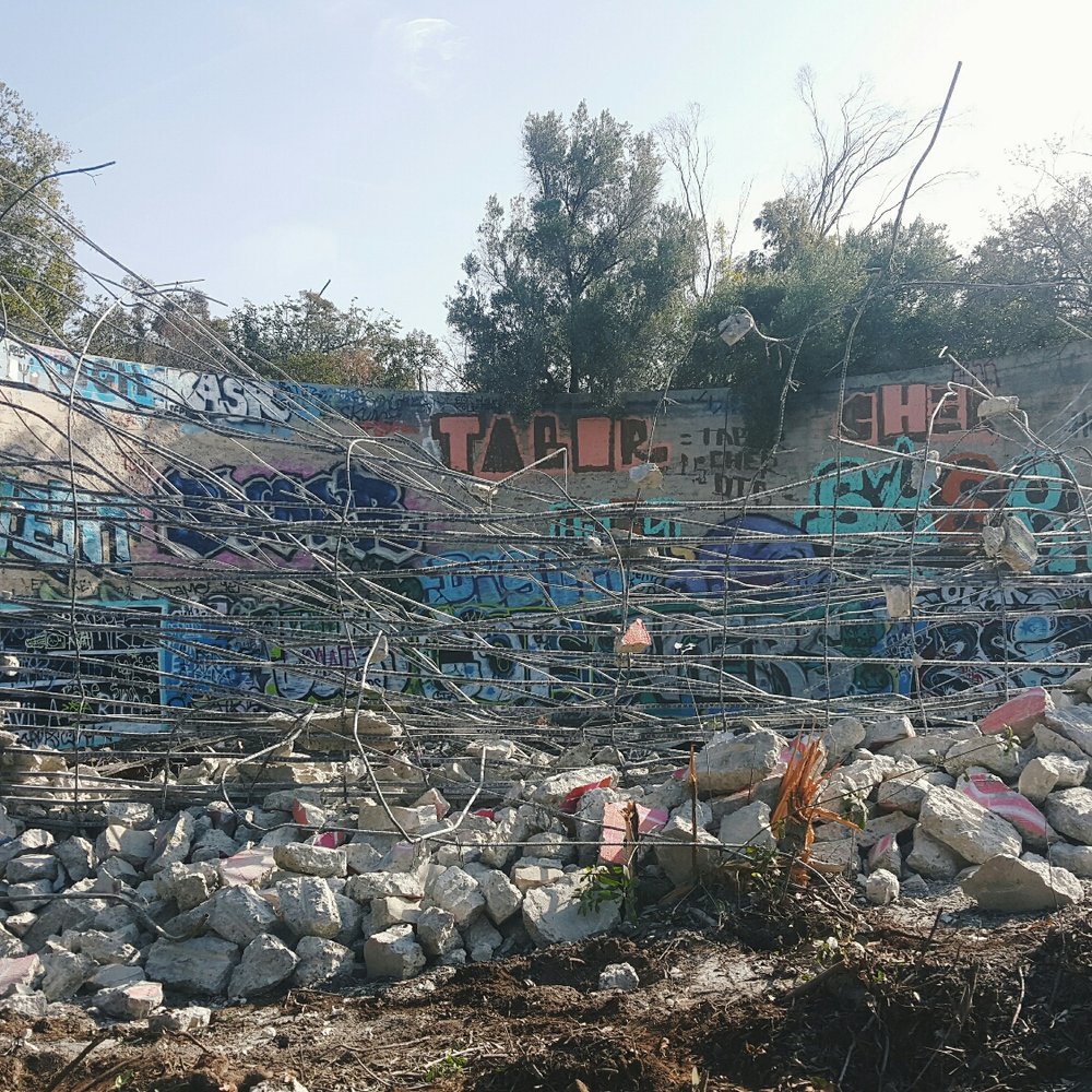 Murphy Ranch Trail - The water tower mid-demo. - Hiking Near Me