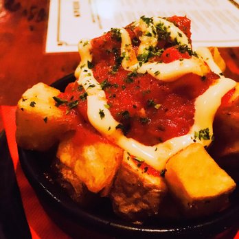 Dida's - Potato Bravas, which means potato With spicy tomato sauce and saffron aioli - Tapas Bars Near Me - Auckland, AUK