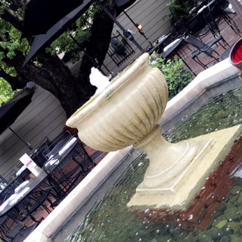 Backstreet Cafe - Don't go chasing water falls! Best table on the patio! Table 21! - New American Near Me - Houston, Texas