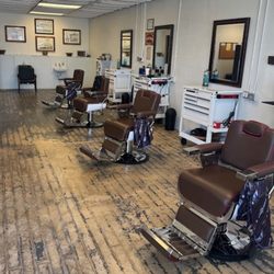 The Barber Shop - view of barbershops' chairs