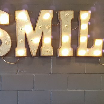 Art Is In Bakery - SMILE sign on the wall - Bakeries Near Me - Ottawa, Ontario Art Is In Bakery - SMILE sign on the wall - Bakeries Near Me - Ottawa, Ontario