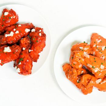 Rebel Wings - a plate of buffalo wings and a plate of buffalo wings - Food Delivery Services Near Me - Houston, Texas Rebel Wings - a plate of buffalo wings and a plate of buffalo wings - Food Delivery Services Near Me - Houston, Texas
