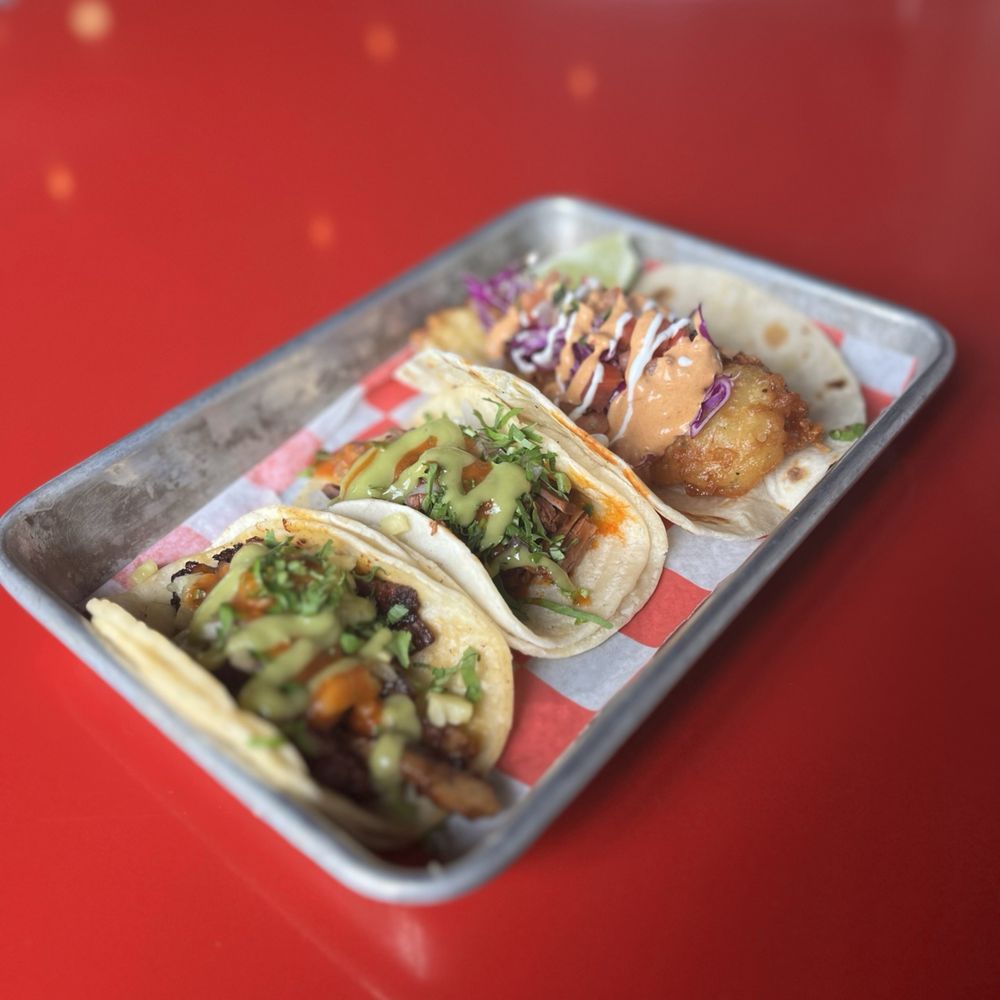 Calle Taco - three tacos on a tray - Tacos Near Me - Nashville, Tennessee Calle Taco - three tacos on a tray - Tacos Near Me - Nashville, Tennessee