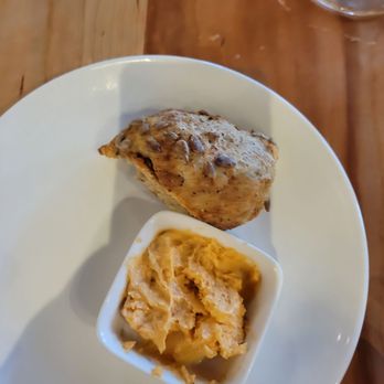 Agapi Bistro + Garden - Sunflower bread with tomato garlic butter - Mediterranean Near Me - Pensacola, Florida Agapi Bistro + Garden - Sunflower bread with tomato garlic butter - Mediterranean Near Me - Pensacola, Florida