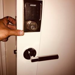 Safeway Locksmith - Evan installing popular Bluetooth deadbolt
