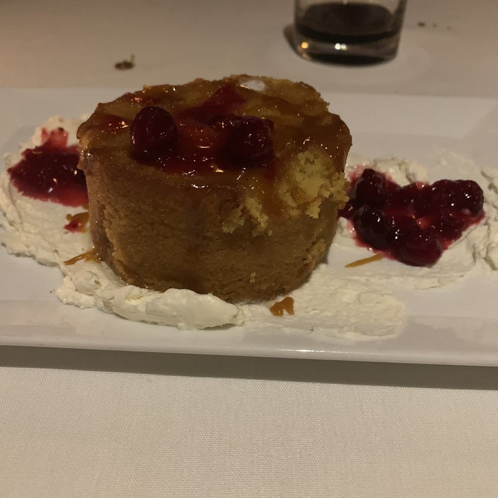 Roots Ocean Prime - Seasonal pumpkin butter cake with cranberry compote - Steakhouses Near Me - Princeton, New Jersey Roots Ocean Prime - Seasonal pumpkin butter cake with cranberry compote - Steakhouses Near Me - Princeton, New Jersey
