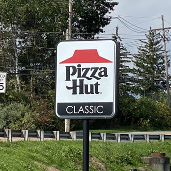 Pizza Hut - a pizza hut sign on the side of the road - Pizza Near Me - Tunkhannock, Pennsylvania