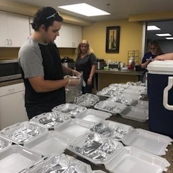 Kingdom Life Church - Preparing the free meals for the football game - Churches Near Me - Cullman, Alabama