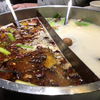 Happy Lamb Hot Pot - The split bowl of broth, half spicy, half regular, both delicious. - Mongolian Near Me - Edison, New Jersey
