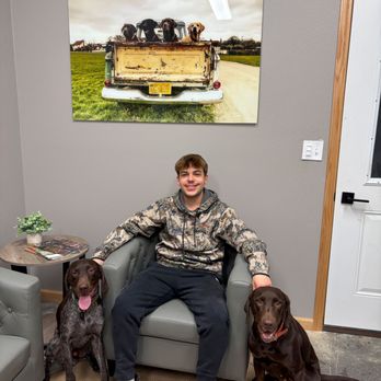 Gerlach Dog Den - Jordan Gerlach with his dogs Gus and Ellie - Pet Boarding Near Me - Mitchell, South Dakota Gerlach Dog Den - Jordan Gerlach with his dogs Gus and Ellie - Pet Boarding Near Me - Mitchell, South Dakota