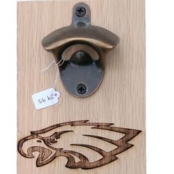 Kathy's Corner Shop - Bottle opener with a Baltimore Raven on it.
