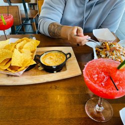 Orale Mexican Eats - Choriqueso, carne asada fries, and a margarita.
