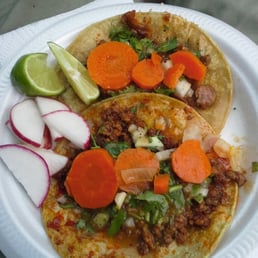 El pastor and chorizo tacos. El pastor and chorizo tacos.