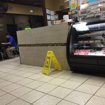 Captain Jj's Fish & Chicken - a caution sign on the floor - Seafood Near Me - Southaven, Mississippi Captain Jj's Fish & Chicken - a caution sign on the floor - Seafood Near Me - Southaven, Mississippi