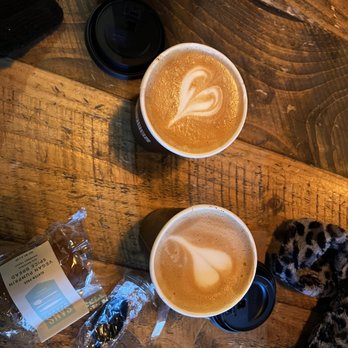 Ground Central Coffee - A vanilla latte, a cappuccino, and a vegan and gluten free pumpkin bread - Coffee & Tea Near Me - New York, New York Ground Central Coffee - A vanilla latte, a cappuccino, and a vegan and gluten free pumpkin bread - Coffee & Tea Near Me - New York, New York