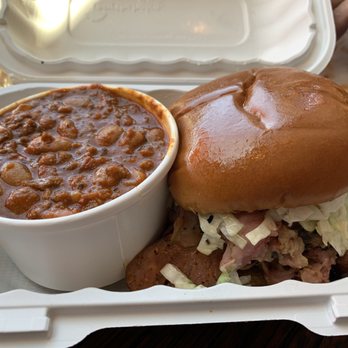 Angry Barnyard BBQ - Fat Moe - smoked porn with sliced Cajun sausage and beans. - Barbeque Near Me - Bakersfield, California Angry Barnyard BBQ - Fat Moe - smoked porn with sliced Cajun sausage and beans. - Barbeque Near Me - Bakersfield, California