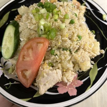 Lil Chef Mama - Pineapple Fried Rice with chicken (no raisins) - Thai Near Me - New York, New York Lil Chef Mama - Pineapple Fried Rice with chicken (no raisins) - Thai Near Me - New York, New York