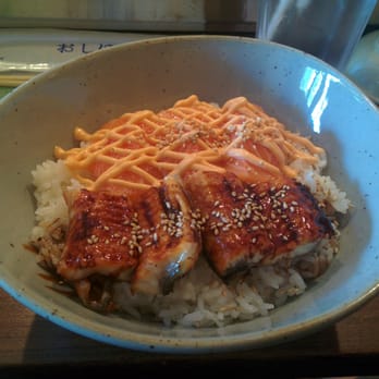 Sasabune Express - Don buri with spicy salmon and eel. Already consumed the side salad that came with it. - Sushi Bars Near Me - New York, New York