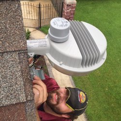 Anytime Electric - Gabe installing an LED security light