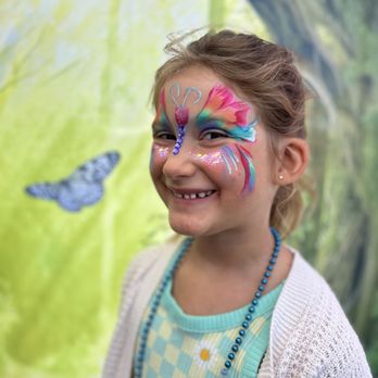 Mela Moon - Butterfly face paint with glitter and gems - Face Painting Near Me Mela Moon - Butterfly face paint with glitter and gems - Face Painting Near Me