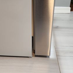 Lowe's Home Improvement - Bent bottom freezer causing the seal to not shut properly.  Half of the freezer is iced up the other side gets mushy