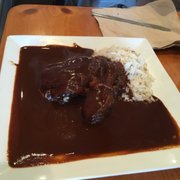 Photo of Canela Cocina Latina - Los Angeles, CA, United States. Chicken in mole
