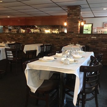 La Riviera - a dining room with tables and chairs - Italian Near Me - Pleasantville, New York La Riviera - a dining room with tables and chairs - Italian Near Me - Pleasantville, New York