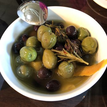 Piatti Danville - Marinated Olives - green ones much less salty than the purple ones - Italian Near Me - Danville, California Piatti Danville - Marinated Olives - green ones much less salty than the purple ones - Italian Near Me - Danville, California