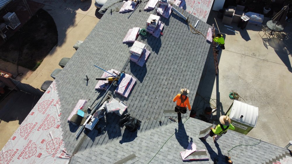 Slide of Home Town Roofing