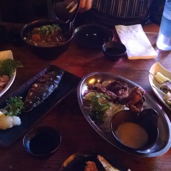 Kenka - from up to left to right: curry soba, fried fatty salmon, toro, fried frog, bacon wrapped asparagus - Sushi Bars Near Me - New York, New York Kenka - from up to left to right: curry soba, fried fatty salmon, toro, fried frog, bacon wrapped asparagus - Sushi Bars Near Me - New York, New York
