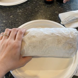Photo of Colima's Mexican Food - San Diego, CA, United States. Hand for scale(even covering 1/4 of it) - California Burrito