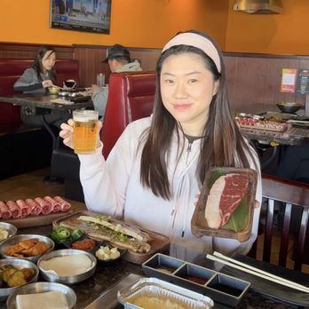 Let's Gogi - Me holding Sapporo beer and the sirloin steak - Korean Near Me - Rowland Heights, California Let's Gogi - Me holding Sapporo beer and the sirloin steak - Korean Near Me - Rowland Heights, California