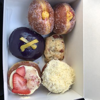Rose Ave Bakery - Top to bottom: passionate fruit donut, halo halo donut, Chinese sausage biscuit, strawberry lychee donut, and ensaymada cruffin - Bakeries Near Me - Washington, DC, District of Columbia Rose Ave Bakery - Top to bottom: passionate fruit donut, halo halo donut, Chinese sausage biscuit, strawberry lychee donut, and ensaymada cruffin - Bakeries Near Me - Washington, DC, District of Columbia