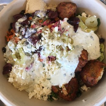CAVA - Bowl with brown rice and super greens, falafel and other goodies - Mediterranean Near Me - Paramus, New Jersey
