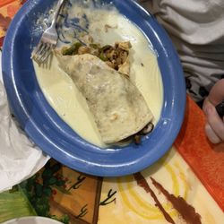 Tequila Mexican Restaurant - Fajita Burrito mixed with chicken and steak