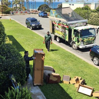 Vets Move Junk - Ronnie and Sterlyn finishing a furniture job. - Junk Removal & Hauling Near Me Vets Move Junk - Ronnie and Sterlyn finishing a furniture job. - Junk Removal & Hauling Near Me