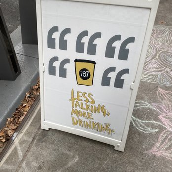 787 Coffee - a sign on a sidewalk - Coffee & Tea Near Me - New York, New York